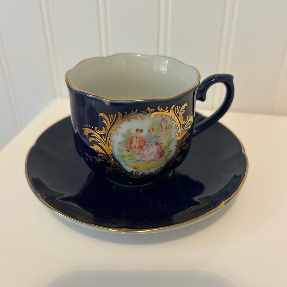 Elegant Blue and Gold Teacup and Saucer Set
